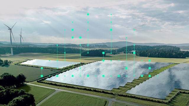 Aerial view of a solar farm with wind turbines in the background, overlaid with green digital data points and lines.