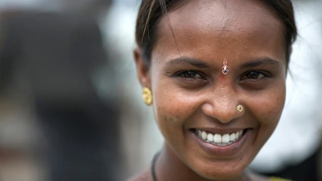 Image of a woman smiling.