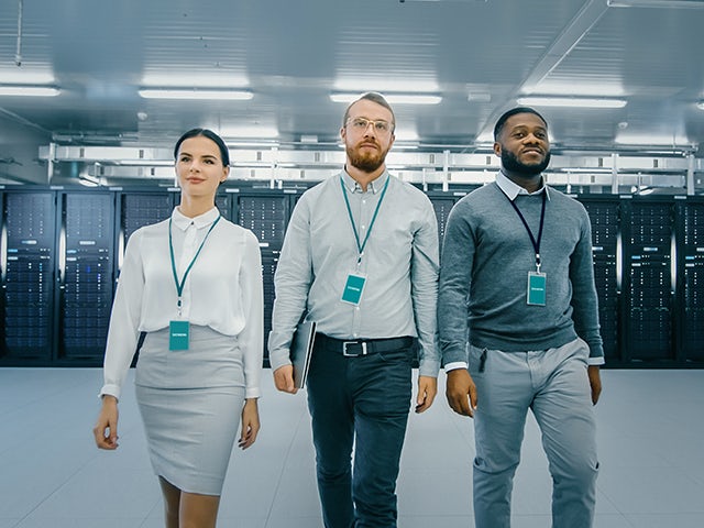 Siemens data center with servers and networking equipment in a modern facility.