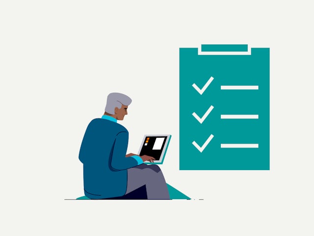 Icon of man typing on a laptop next to checkmark graphic.