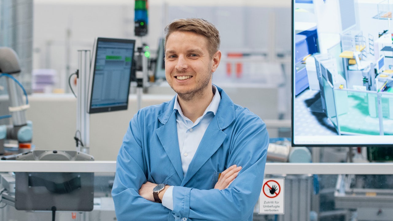 A digital twin concept visualization with a person's silhouette and a digital interface.