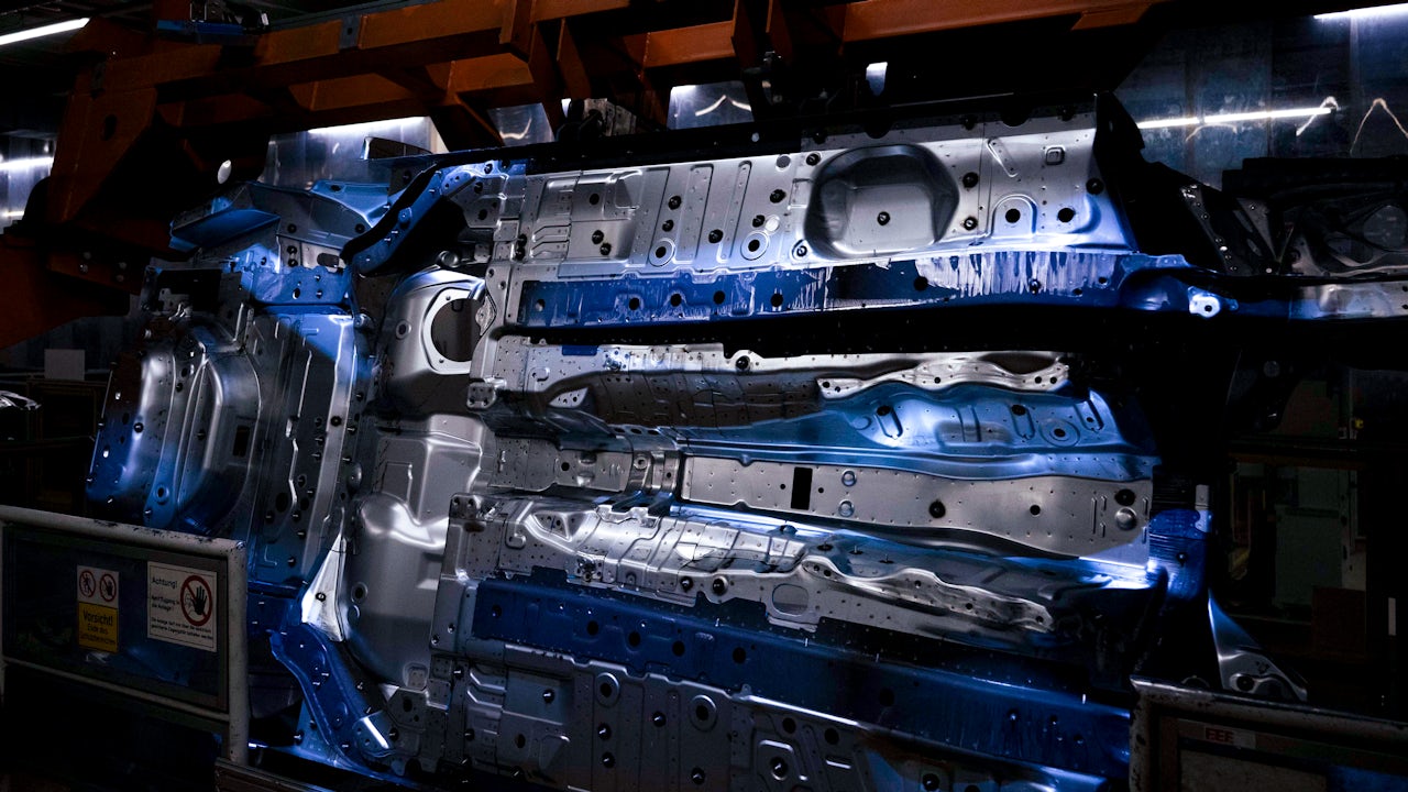 An Audi assembly being assembled.