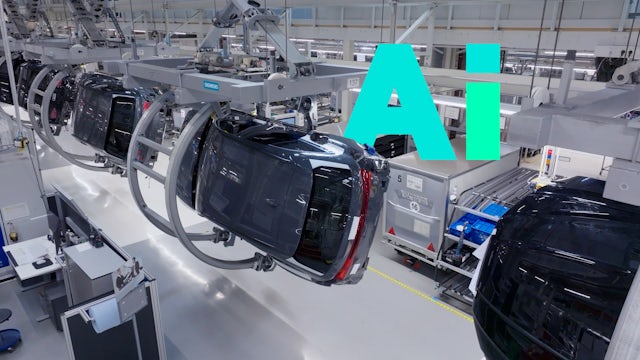 Audi cars on an assembly line.