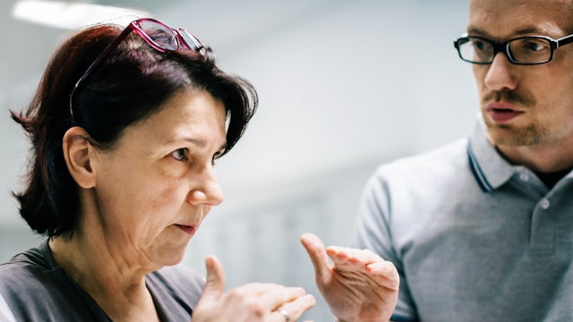 Two people collaborating in an office.