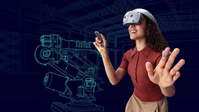 A woman uses the industrial metaverse concept of a digital world to mirror and simulate real machines and factories, buildings and cities, grids and transportation systems via virtual reality.