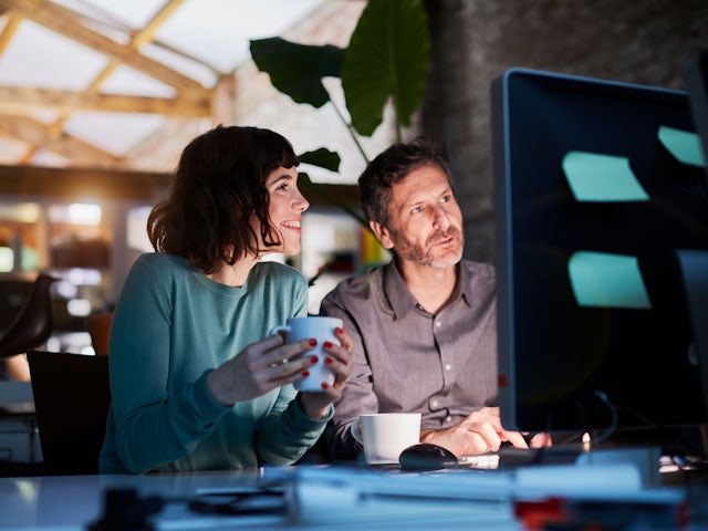 A person's hand holding a smartphone with a lock icon, symbolizing digital security and protection.