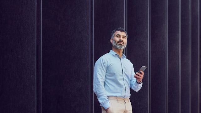 A man holding a phone.