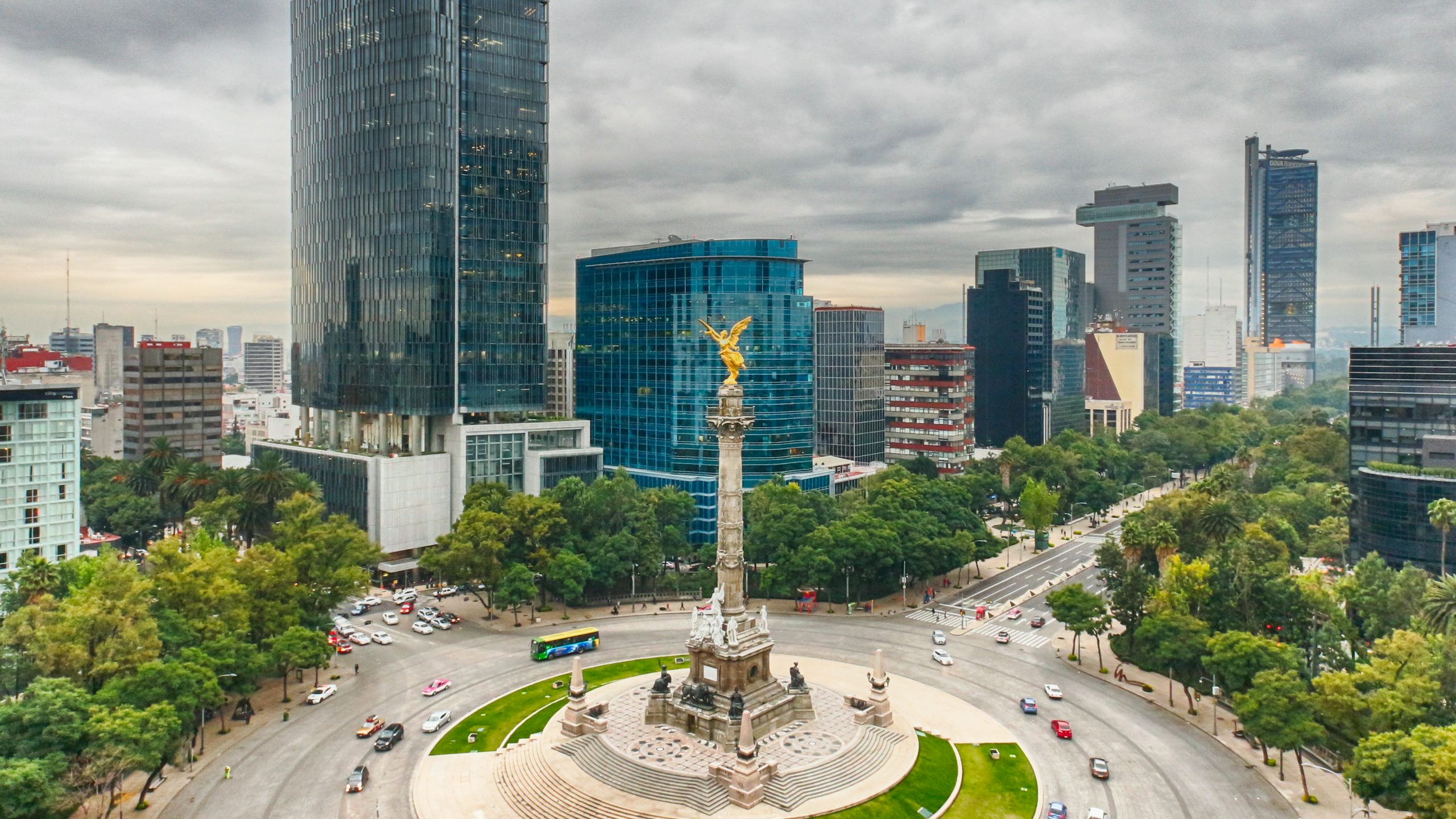 A statue of an angel with wings spread wide, located on Paseo de la Reforma in Mexico City.