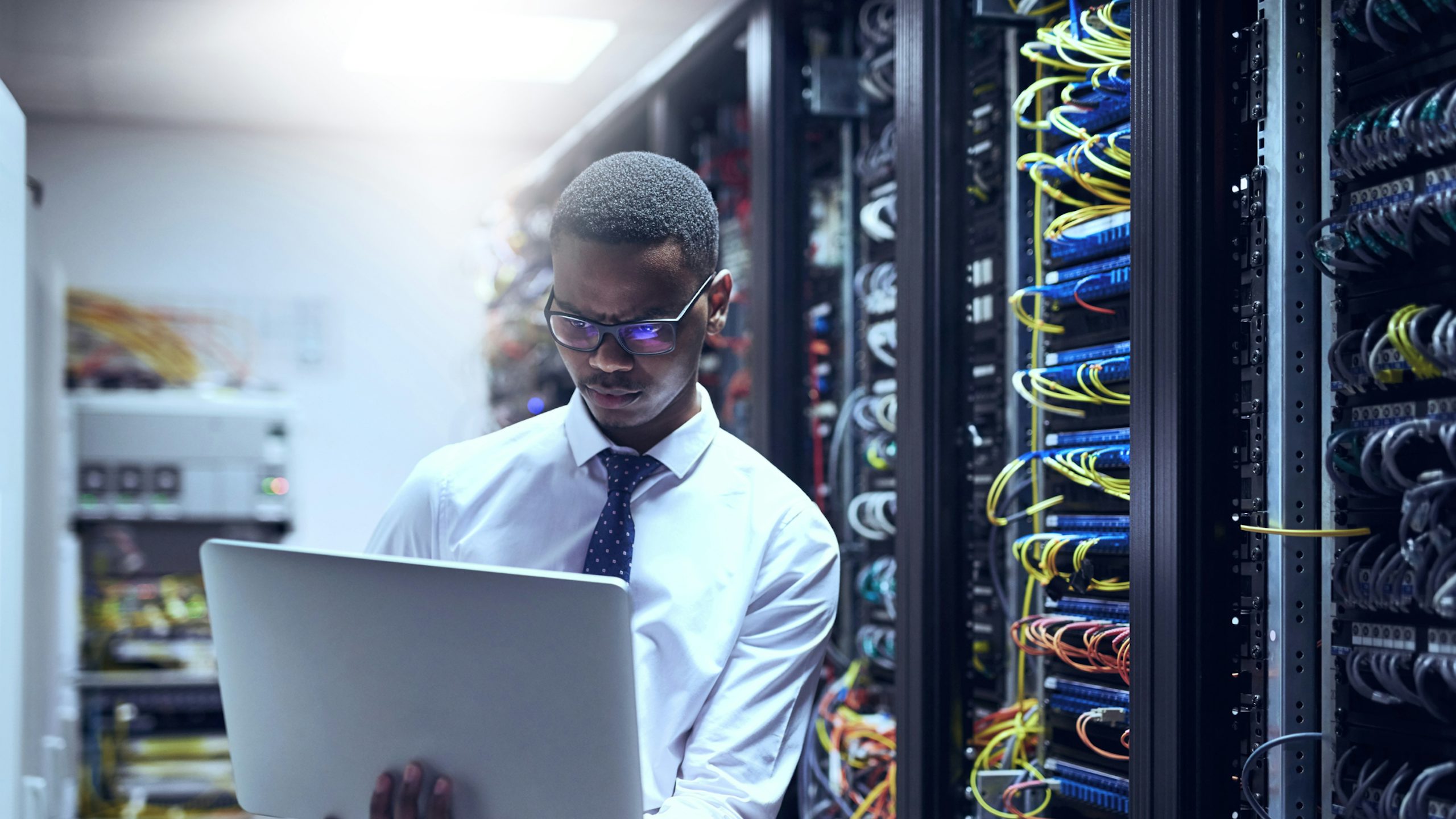 Industrial specialist in control room.