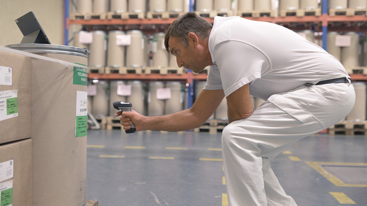 Employee with a scanner