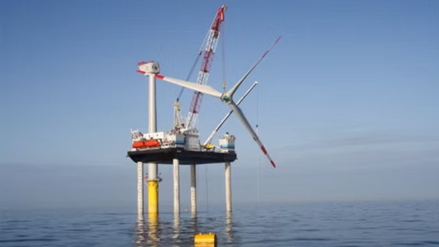 Offshore wind turbine on platform in open water