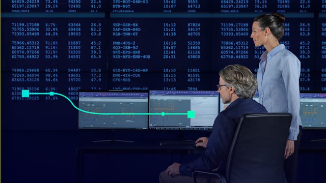 Scientist analyzing industrial graph data in a research laboratory setting