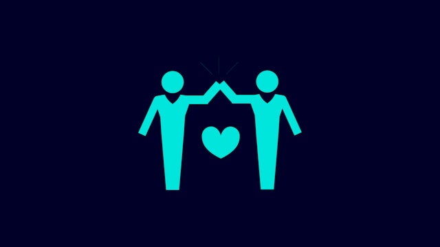 A person holding a heart-shaped balloon with a message that reads "Belonging"