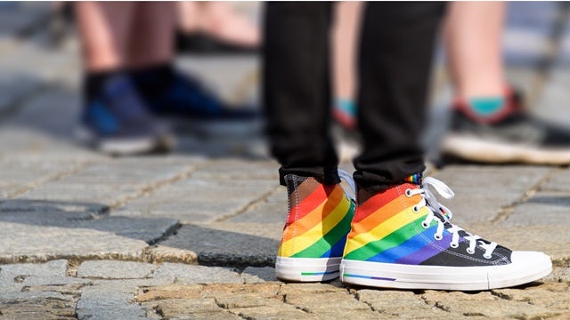 Image of rainbow colored shoes.
