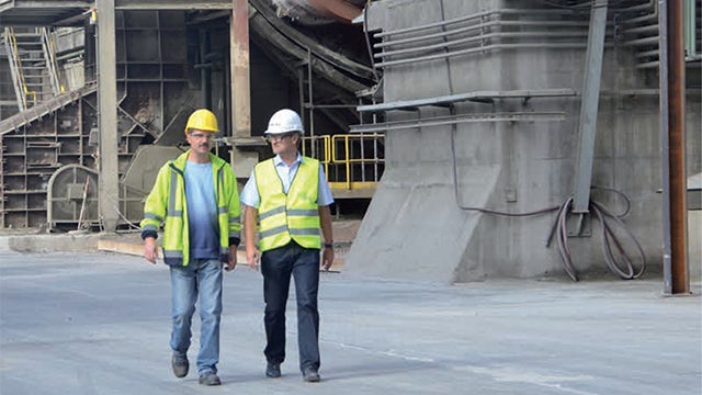 A magazine cover featuring a cement industry article with a focus on minerals.