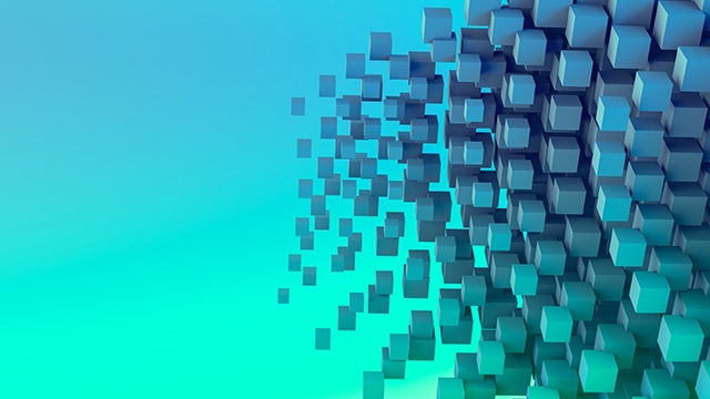 A person is standing in front of a large screen displaying a graph with a blue background.