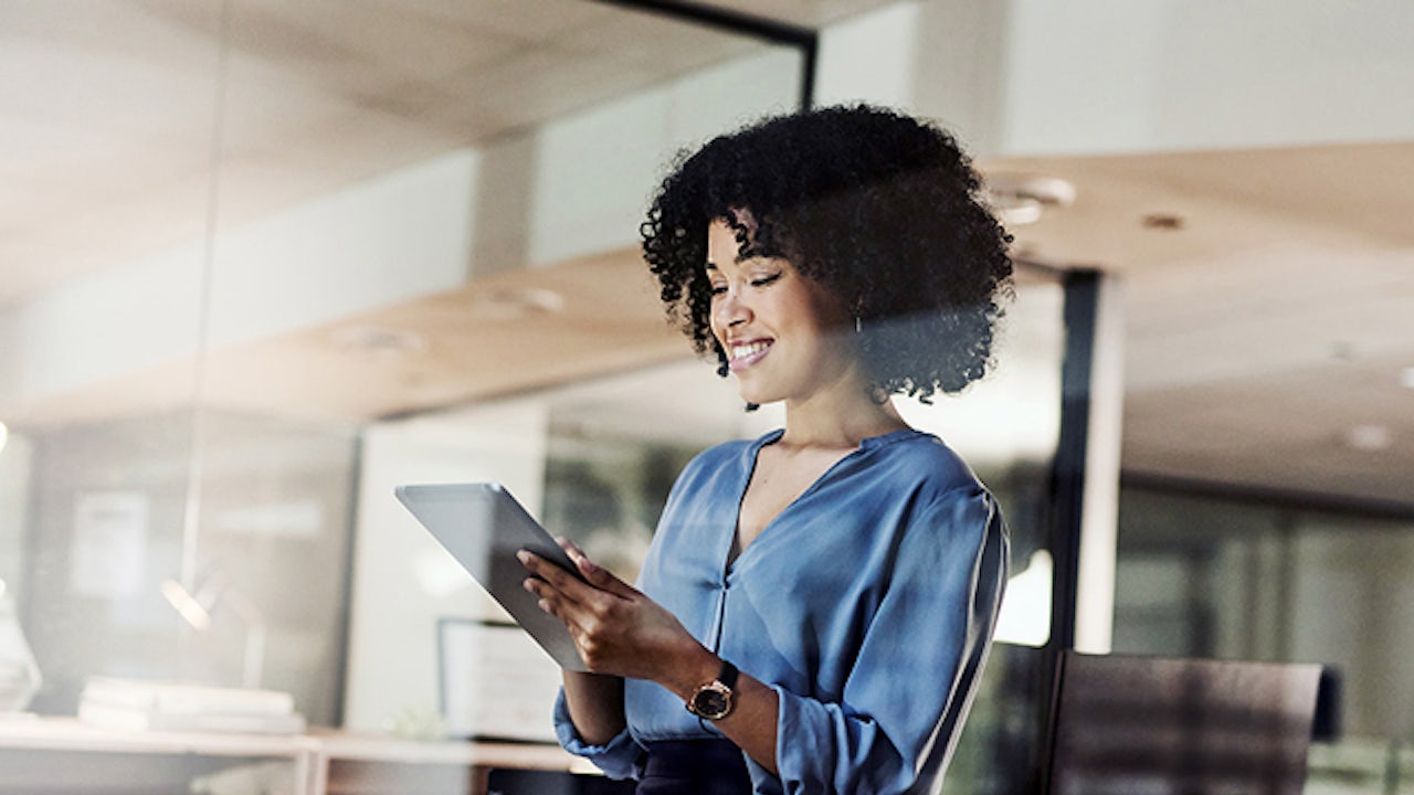 Person holding smartphone with glowing network connections emanating from screen