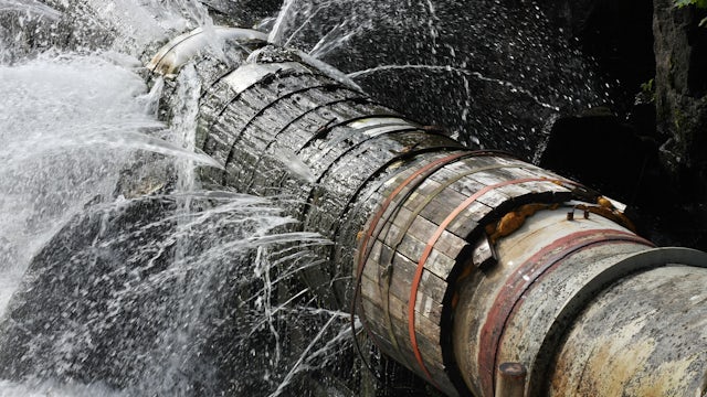 A large industrial pipe with leaks.
