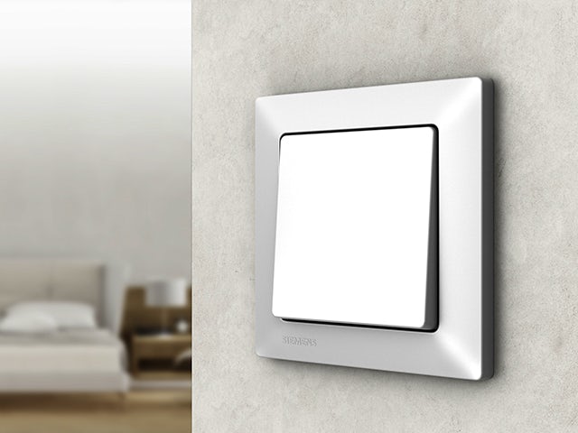 A promotional image for Delta Line I System switches and sockets, showcasing a clean and modern design.