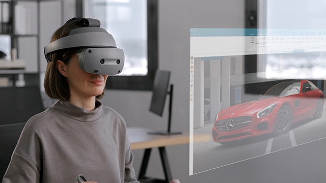 A female engineer uses immersive engineering to speed up product development in a Digital Enterprise