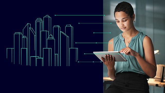 A woman viewing a digital twin of a cityscape from a laptop computer.