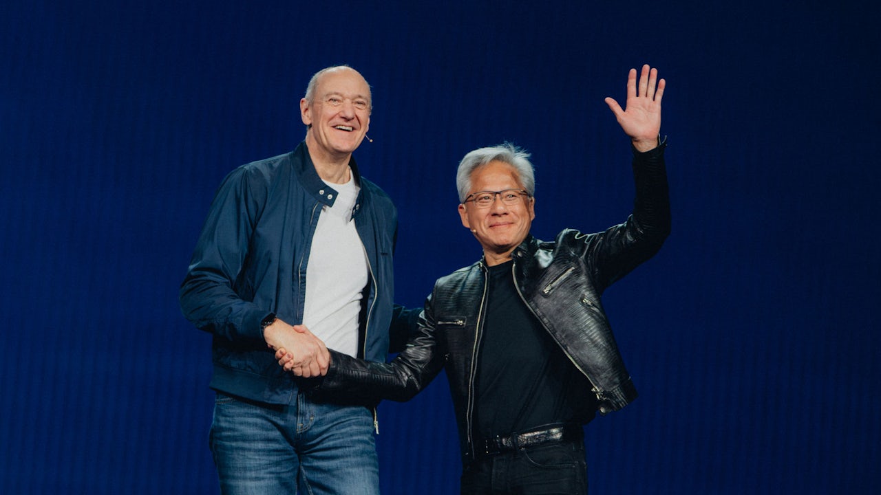 Roland Busch and Jensen Huang shaking hands at CES 2026