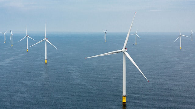 Wind turbines in the ocean.