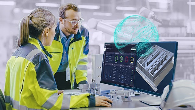 Two plant engineers exploring digital lifecycle technology