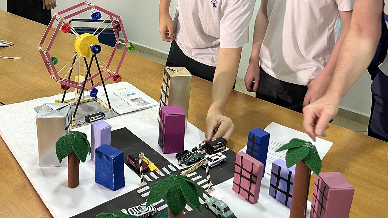 Group of educators in Sao Paulo workshop discussing strategies for creating a sustainable future for education.