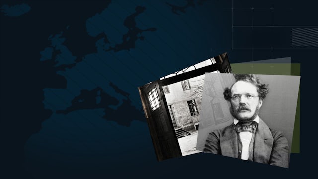 Ancient stone statues on grassy hill overlooking ocean at sunset