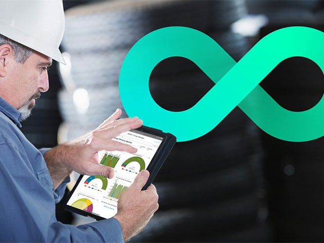 A fire protection facility with a tire production plant in the background.