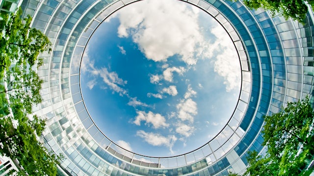 Colorful hot air balloons floating in a clear blue sky