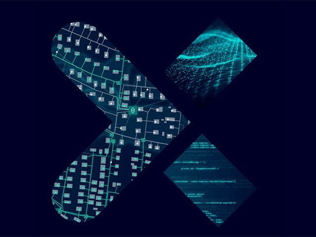 Two people in business attire shaking hands in an office setting