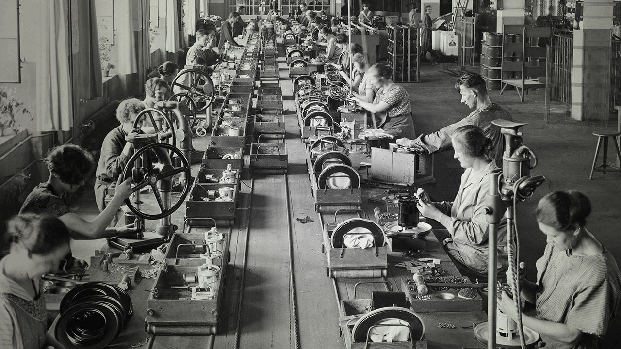 Assembly line production of vacuum cleaners at the Elektromotorenwerk, Siemens' electric motor plant in Berlin,1930.</br>