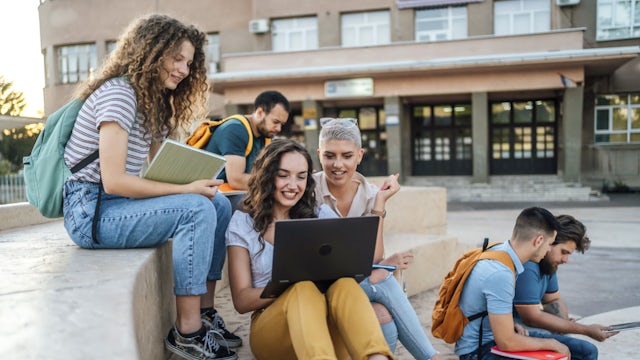 A white paper cover about campus developments benefiting students and academia.