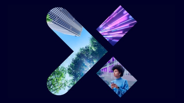 The letter X with an inlay of a brightly colored photograph of a city building panorama.