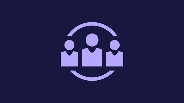 A person is standing in front of a building with a sign that reads "Inclusion Level" on it.