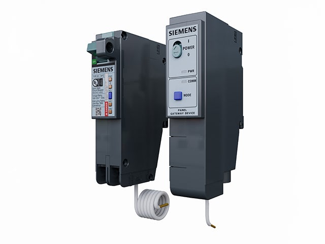 Circuit breaker panel with digital display and control buttons mounted on a metal enclosure.