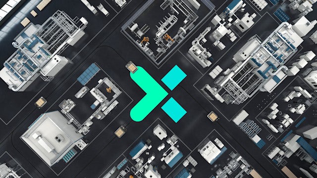 An aerial view of a shop floor layout with a green and blue “X” logo in the middle.