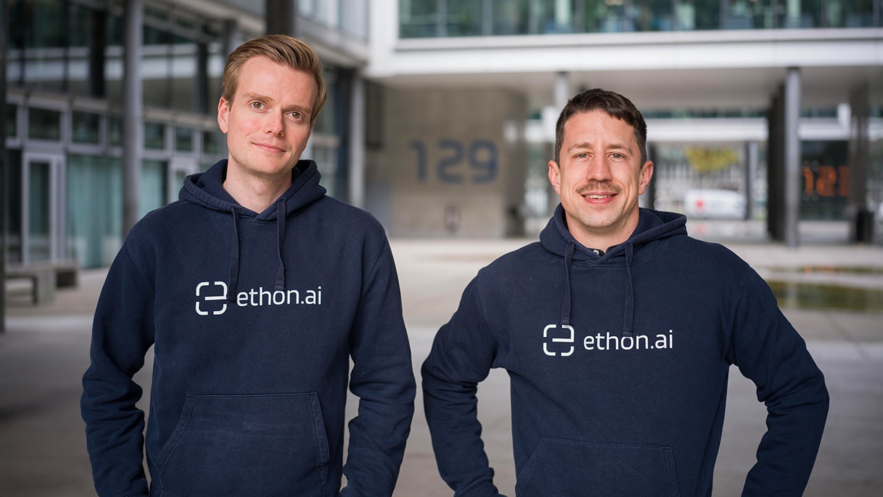 A professional presenting an AI workflow diagram with key insights on production challenges and error analysis.