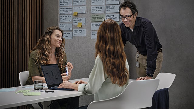 A person is standing in front of a whiteboard with a diagram and text about health and safety.