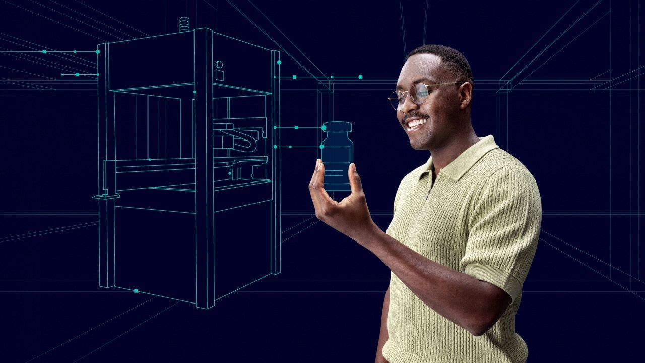 A Siemens product image featuring a person in a lab coat working on a machine. 