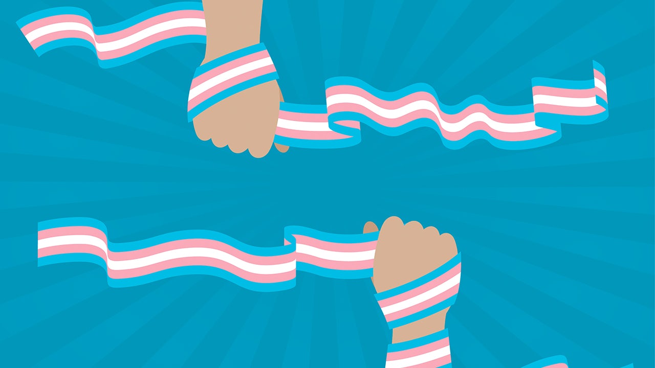 Siemens promotes LGBTQ+ inclusion with a diverse group of employees in a meeting.