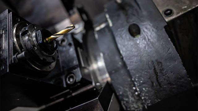 Close up photo of a machine drill, a machine tool.