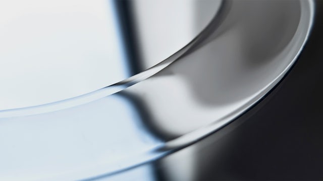 Abstract close-up image of the metal-forming process.