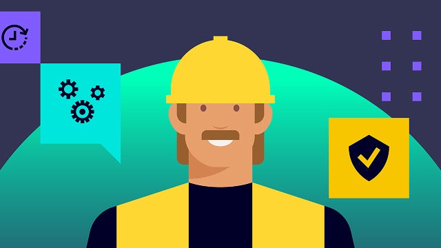 A person wearing a helmet and a reflective vest is standing in front of a construction site.