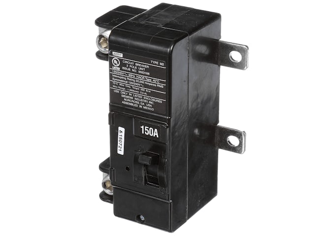 A person wearing a black shirt and a white face mask is standing in front of a white wall.