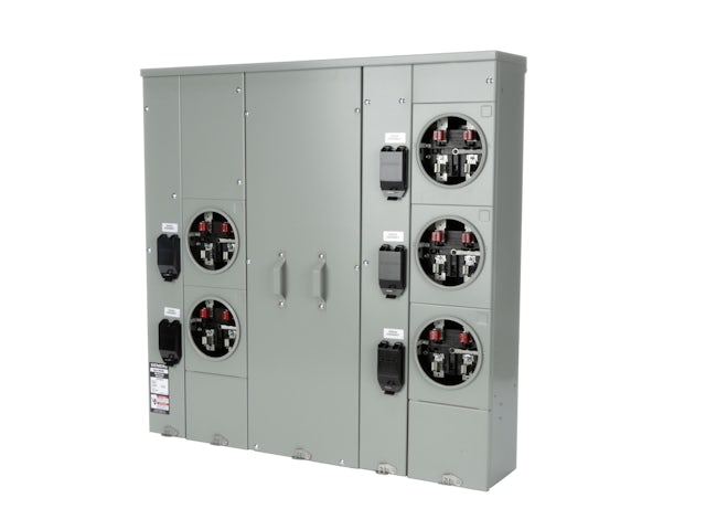 A man in a suit and tie standing in front of a Siemens logo. 