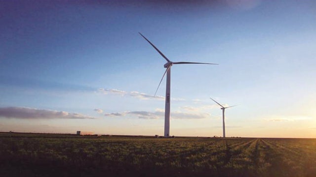 Wind turbines in an open field