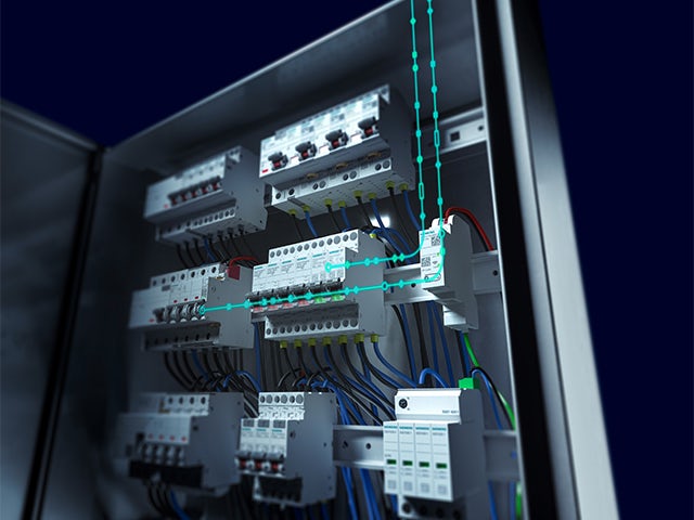 Electrical circuit breaker with blue and gray casing, mounted on a metal rail against a blurred background